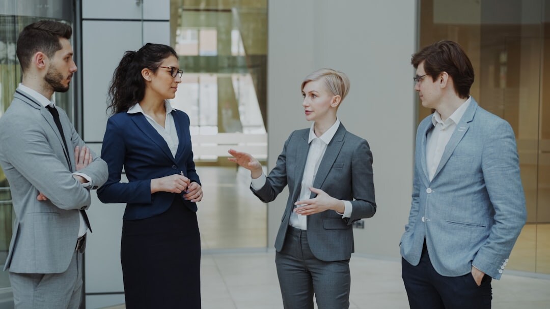 diverse business professionals talking