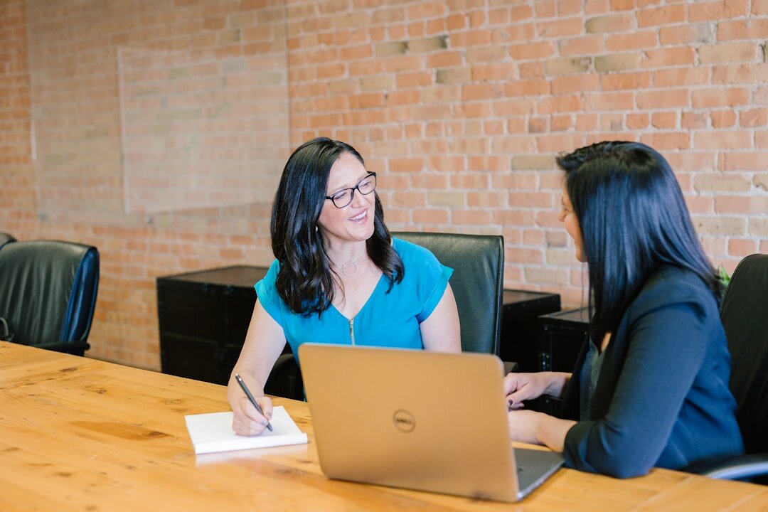 woman leading business meeting